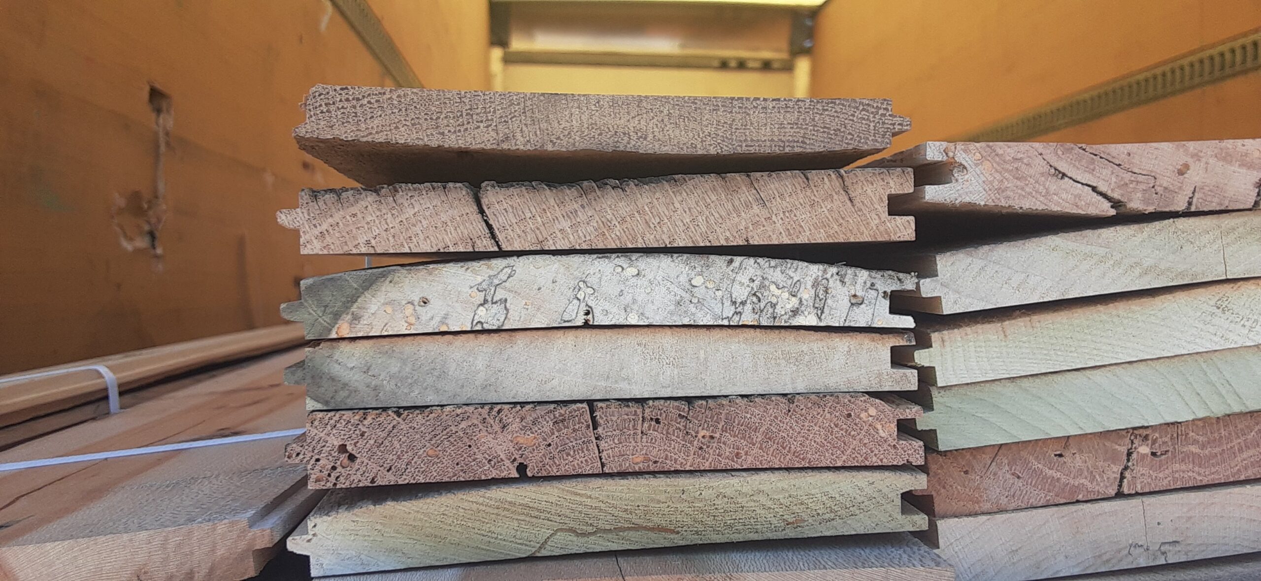 Stack of reclaimed wood flooring